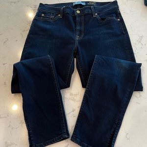7 For All Mankind  Skinny ankle jean in a dark wash. Size 31